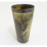 A Victorian horn beaker with silver rim hallmarked London 1884. Approx 5 1/2" high Please Note -