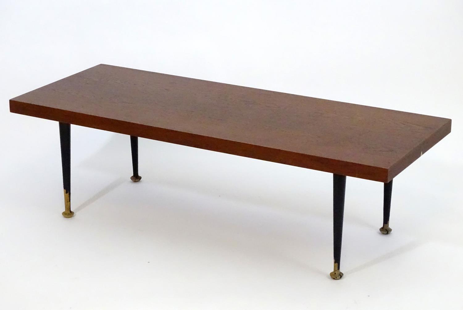 A mid 20thC Meredew coffee table with a rectangular teak top above four turned tapering legs. - Bild 5 aus 7