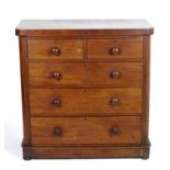 A late 19thC mahogany chest of drawers comprising two short over three long graduated drawers with