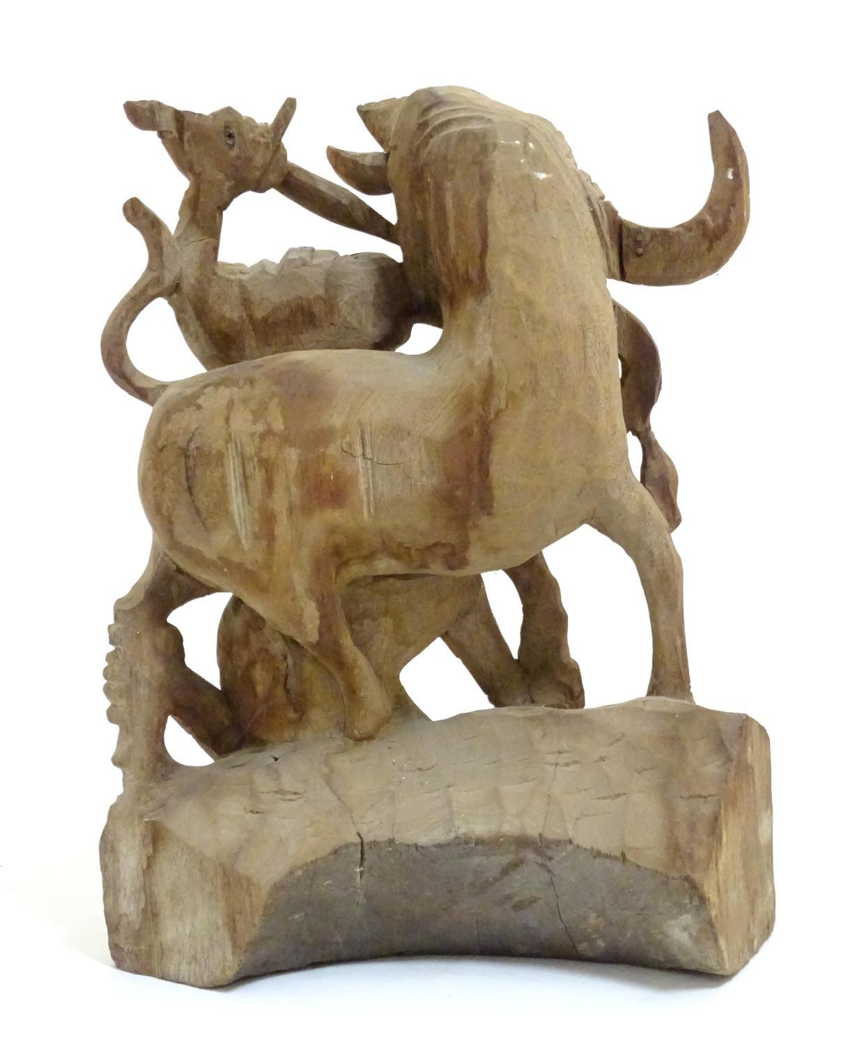 An Asian 20thC carved wooden sculpture modelled as a bull and warrior with polychrome decoration. - Image 5 of 8