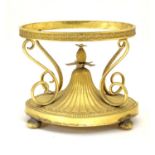 A c.1903 Elkington & Co. gilt metal oval centrepiece stand with scrolling decoration and central