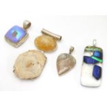Four various silver and white metal mounted pendants, including an Art Glass example 2 1/2" long