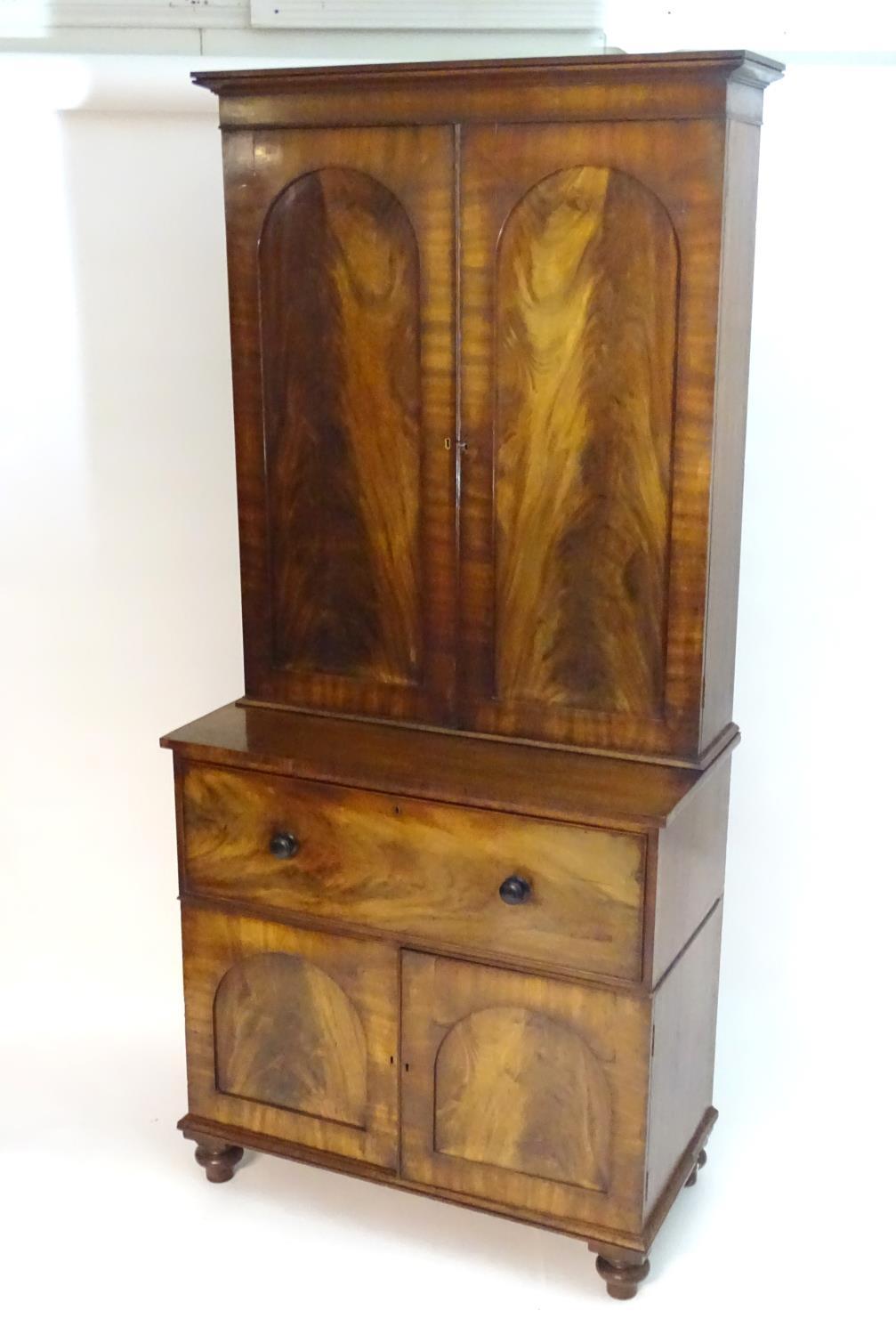 A mid 19thC mahogany secretaire bookcase, having a moulded cornice above two flame mahogany panelled - Bild 3 aus 8