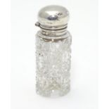 A cut glass scent / perfume bottle with silver mount and lid, hallmarked Birmingham 1913. 2 1/2"