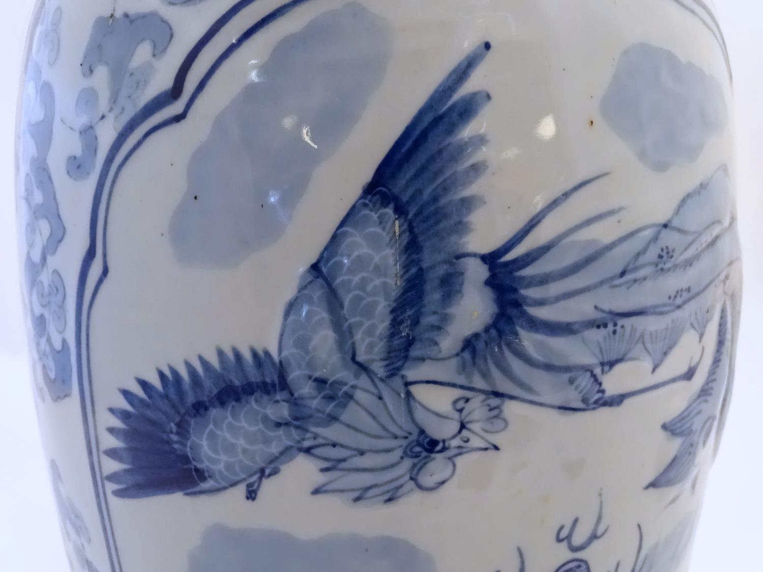 A large Chinese blue and white vase decorated with flowers, foliage and a stylised phoenix and - Image 10 of 10