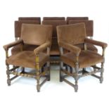 A set of eight early 20thC oak Jacobean style dining chairs with block and turned supports and