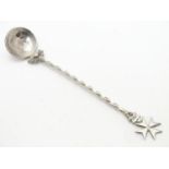 A Maltese silver shallow ladle/ice cream spoon, the twisted handle terminated with a Maltese