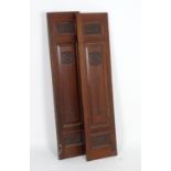 A pair of early 20thC mahogany panels with carved Art Nouveau decoration. 13" wide x 55" high.