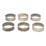 Six silver napkin rings with engraved acanthus scroll decoration. Hallmarked 1919 (6) Please