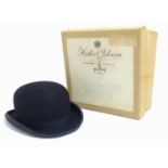 An early 20thC handmade fur felt bowler hat contained within original Herbert Johnson hatters box.