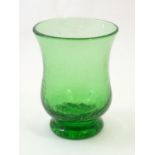 A green glass vase with crackle detail. Approx. 6? high. Please Note - we do not make reference to