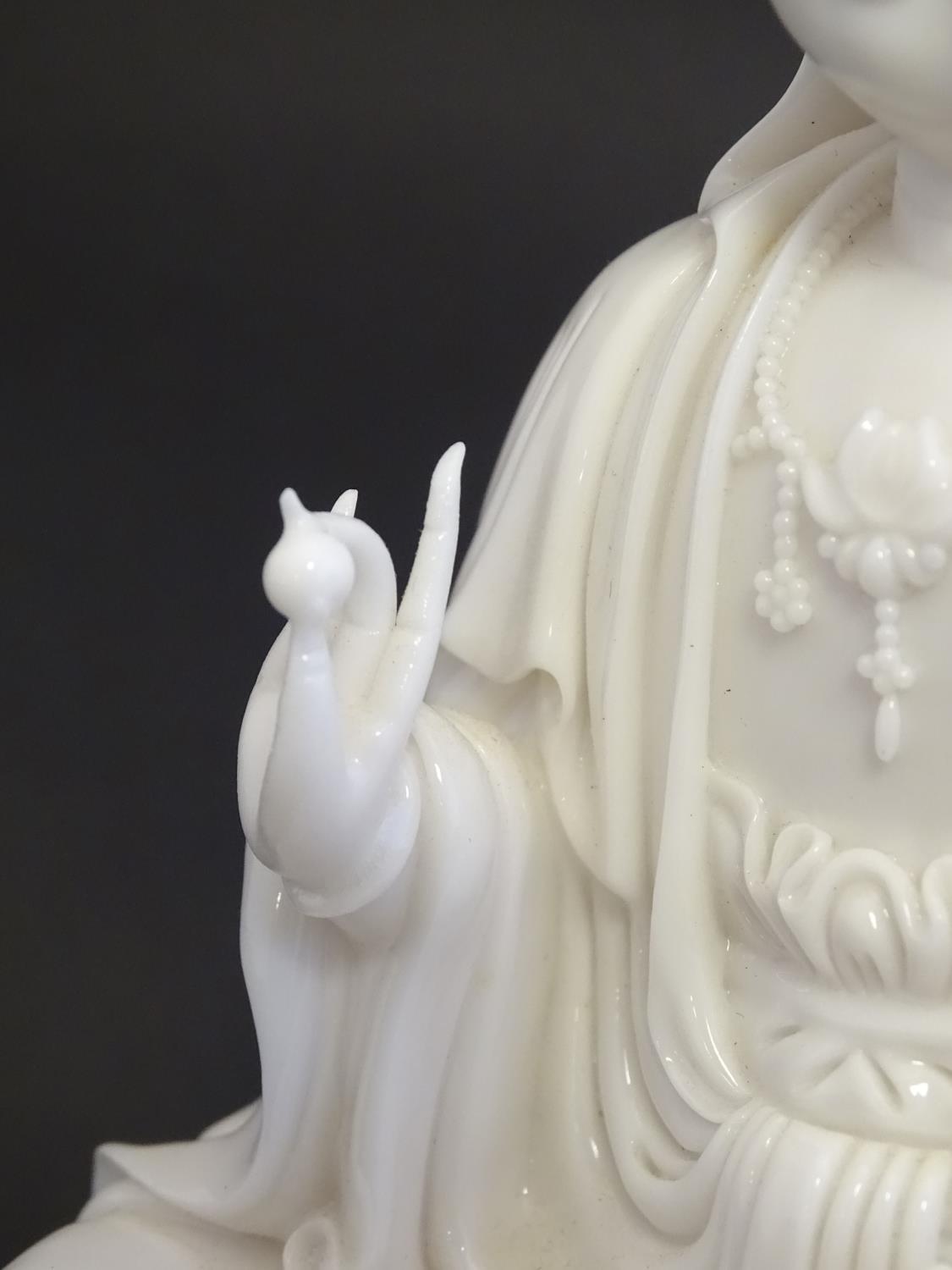 A Chinese blanc de chine figure depicting Guanyin seated on a lotus flower base. Approx. 7 1/2" high - Image 13 of 16