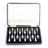 A cased set of 12 silver forks