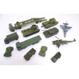 Toys: A quantity of Dinky Toys die cast scale model military vehicles comprising AEC Articulated