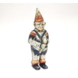 A 21stC cast money box formed as a clown with polychrome decoration. Approx. 5 1/2" high Please Note