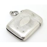 A Victorian silver vest case with engine turned decoration. hallmarked Birmingham 1891 maker