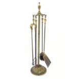 Garden & Architectural, Salvage: an early to mid 20thC brass fireside companion set, comprising