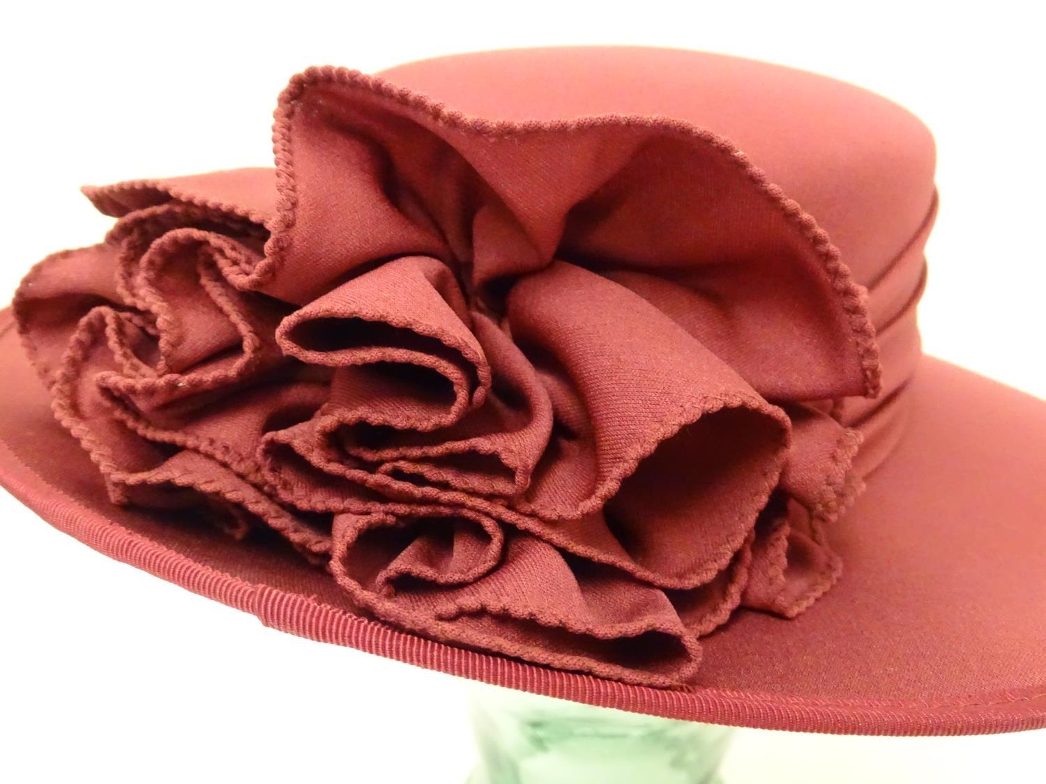 A ladies red hat by Kangol Please Note - we do not make reference to the condition of lots within - Image 5 of 7