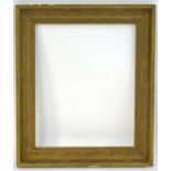 A gilt and gesso moulded picture frame. Approx. 28 1/4" x 22 3/4" Please Note - we do not make
