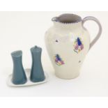 A Carter Stabler Adams jug with hand painted floral detail, marked under for 1921. Together with a