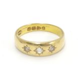 A Victorian 18ct gold diamond ring set with three diamonds. Hallmarked Chester 1897. Ring size