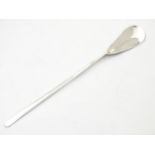 A silver spoon hallmarked Edinburgh 2002 maker PJM ( possibly Merriman Silver Ltd ) 4 1/4" long