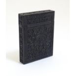 A Victorian ebonised card case with floral and foliate carved detail. Approx. 4 1/4" Please Note -