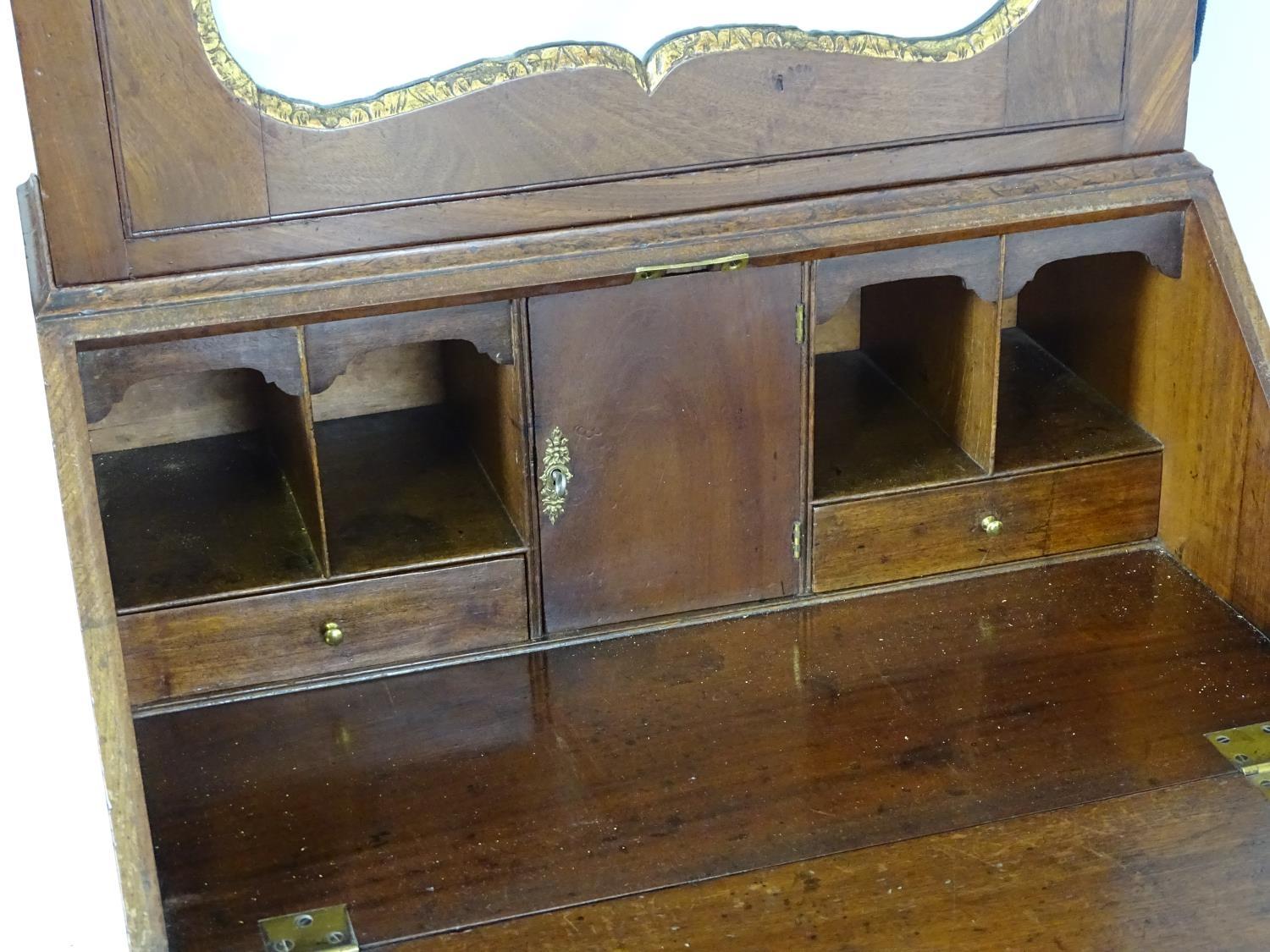 A Regency mahogany bureau bookcase with a moulded cornice above a dentil frieze and shaped - Bild 7 aus 14