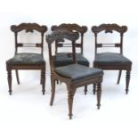 A set of four 19thC mahogany side chairs with heavily carved cresting rails and above foliate carved