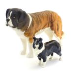 Two Beswick dogs, a St Bernard model no. 2221, and a Border Collie model no. 1854 with gold stamp.