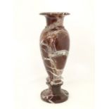 A specimen marble vase of baluster form with a flared rim. Approx. 11 3/4" high Please Note - we