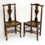 Two early 19thC oak side chairs with shaped top rails and vase shaped splays above turned tapering