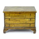 An 18thC elm box with a moulded lid and three false drawers with Dutch drop handles, the box