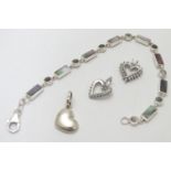 A silver bracelet set with abalone shell detail together with and 3 assorted charms (4) Please