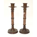 A pair of 20thC cast bronze candlesticks with marble columns. Approx. 16" high Please Note - we do