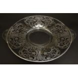 A glass twin handled fruit dish / plate with silvered overlay decoration Approx. 13" wide overall