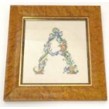 A 20thC cross stitch embroidery / needlework depicting the alphabet letter A formed from stylised