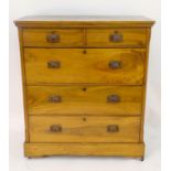 A mid / late 19thC solid camphor wood chest of drawers of large proportions, comprising two short