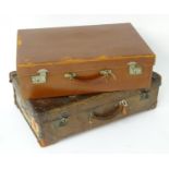 An early 20thC brown leather Gentleman's travelling suitcase, the interior with fitted sections, the