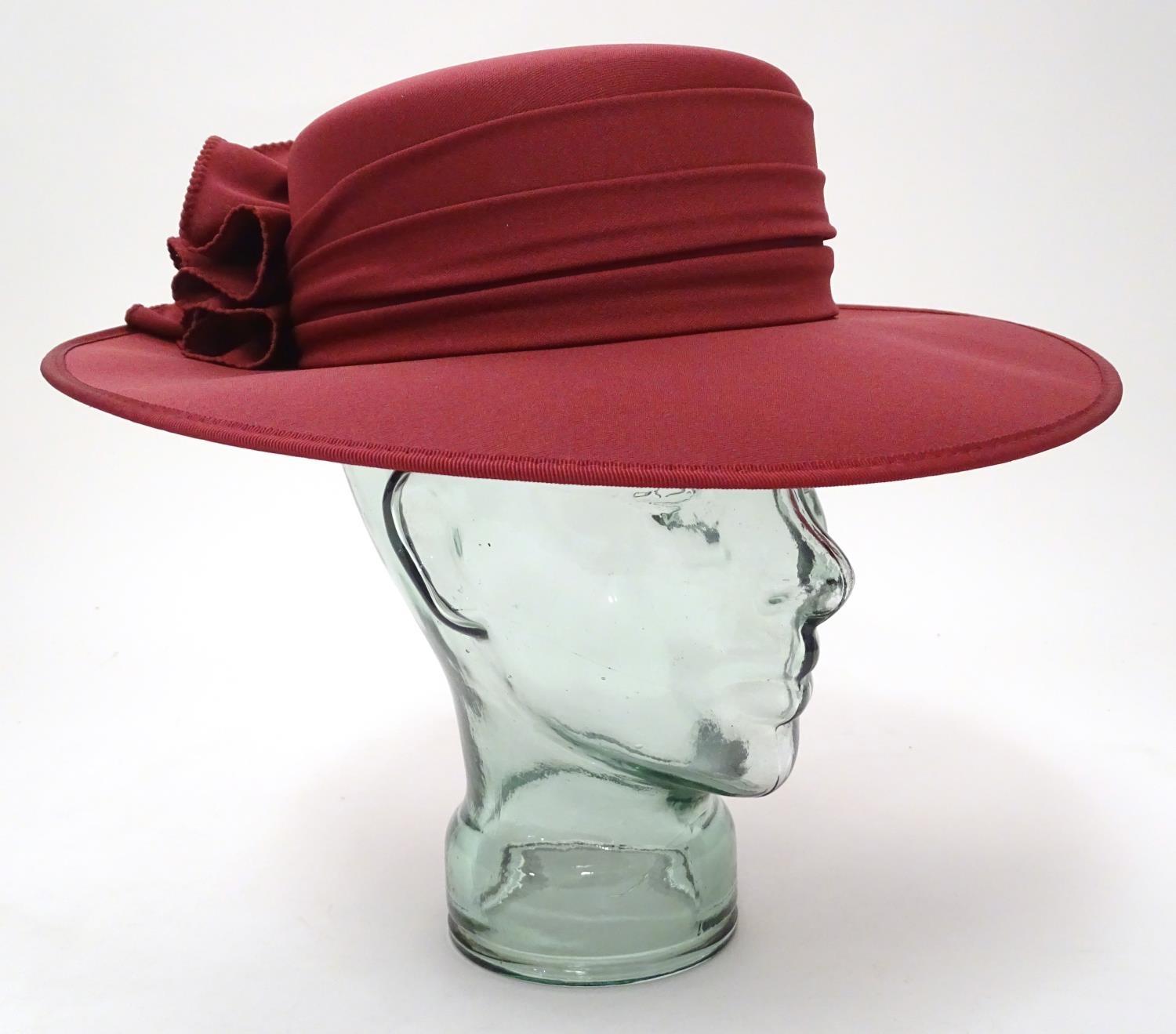 A ladies red hat by Kangol Please Note - we do not make reference to the condition of lots within - Image 3 of 7
