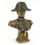 A 20thC cast bust of emperor Napoleon Bonaparte wearing uniform and a bicorne hat, with gilt