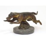 A late 19th / early 20thC cold painted bronze car mascot modelled as a running hound / dog, on an