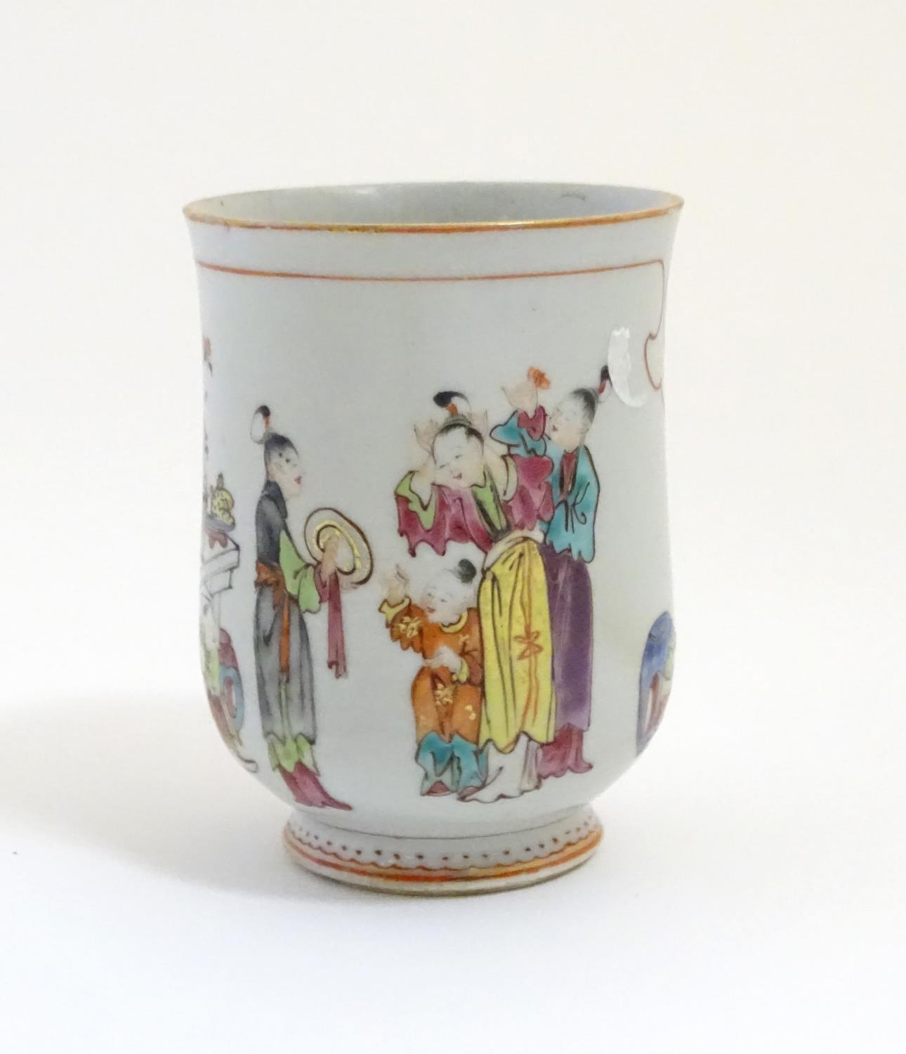 A Chinese export famille rose mug / tankard decorated with figures in a domestic interior scene, and - Image 3 of 5