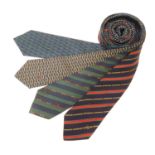 4 Gucci silk ties, various designs in greens, black and blues (4) Please Note - we do not make