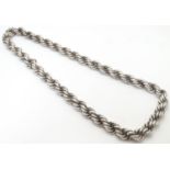 A large silver rope twist necklace. The ropetwist approx 1/2" wide x 30" long. (342g) Please
