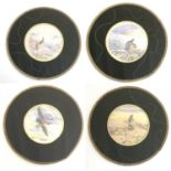 Four placemats each set with painted silk detail to centre depicting various game birds. Placemats