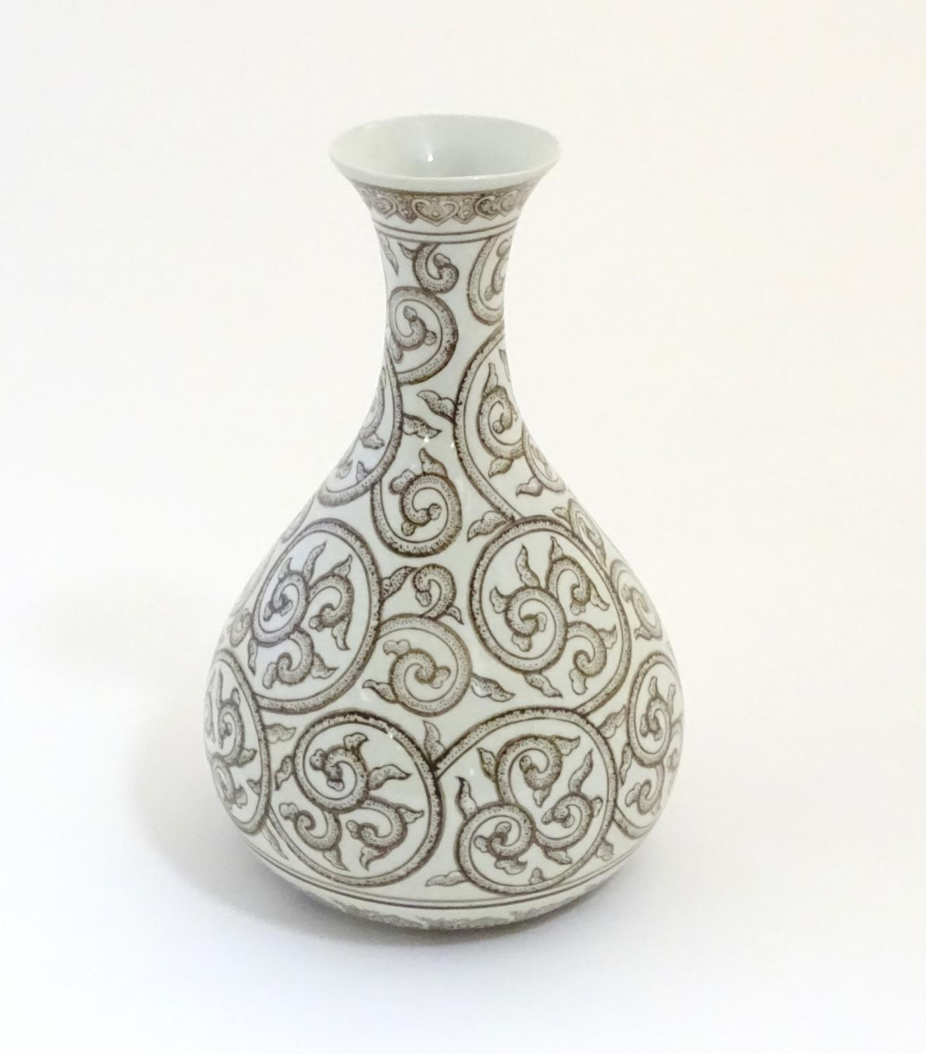 A Chinese baluster vase with a flared rim decorated with stylised scrolling foliage with dotwork - Image 3 of 5