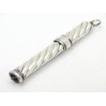 A white metal pencil holder / slide by Samson Mordan & Co. 4" long Please Note - we do not make