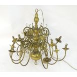 A mid to late 20thC two-tier pendant electrolier, with eighteen lights over two tiers, 36" tall