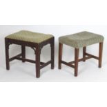 Two mahogany 18thC stools with shaped tapering legs and united by H stretchers. The largest